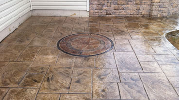 This image shows a stained stamped concrete floor.