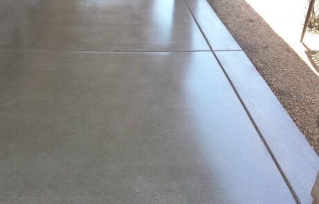 This image shows a pool deck that will be resurfaced because it was damaged