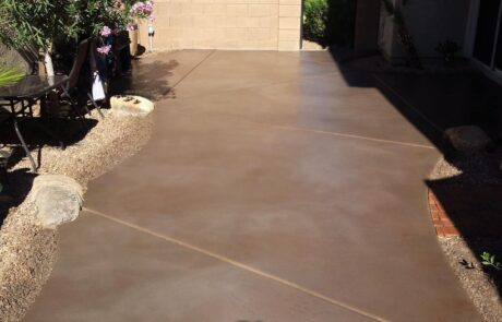 This image shows a stained concrete walkway