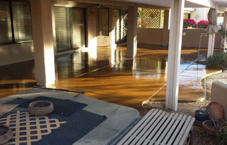 This image shows a patio that has a newly stained floor.