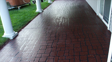 This image shows a patio that has been concrete stained by a profesional concrete contractor in Phoenix.