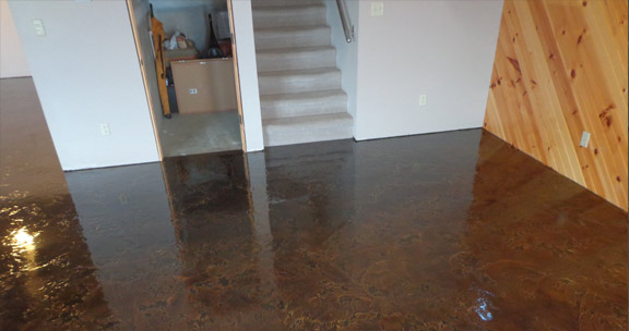 This image shows a basement that was applied with concrete stained.