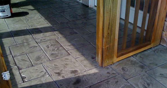 This image shows a patio with stamped concrete floor.
