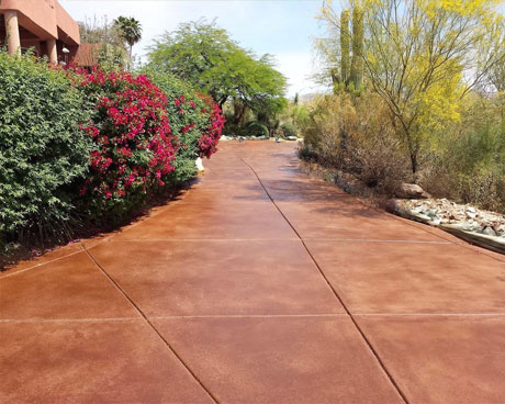 This image shows a driveway that was newly coated.