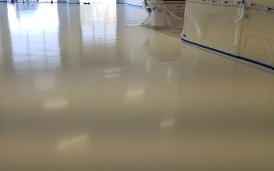 This image shows a shop with a white epoxy floor.