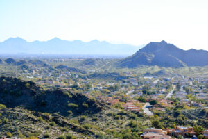 This image shows houses and mountains in North Mountain Village, Phoenix
