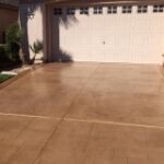 This image shows a driveway which was newly stained.