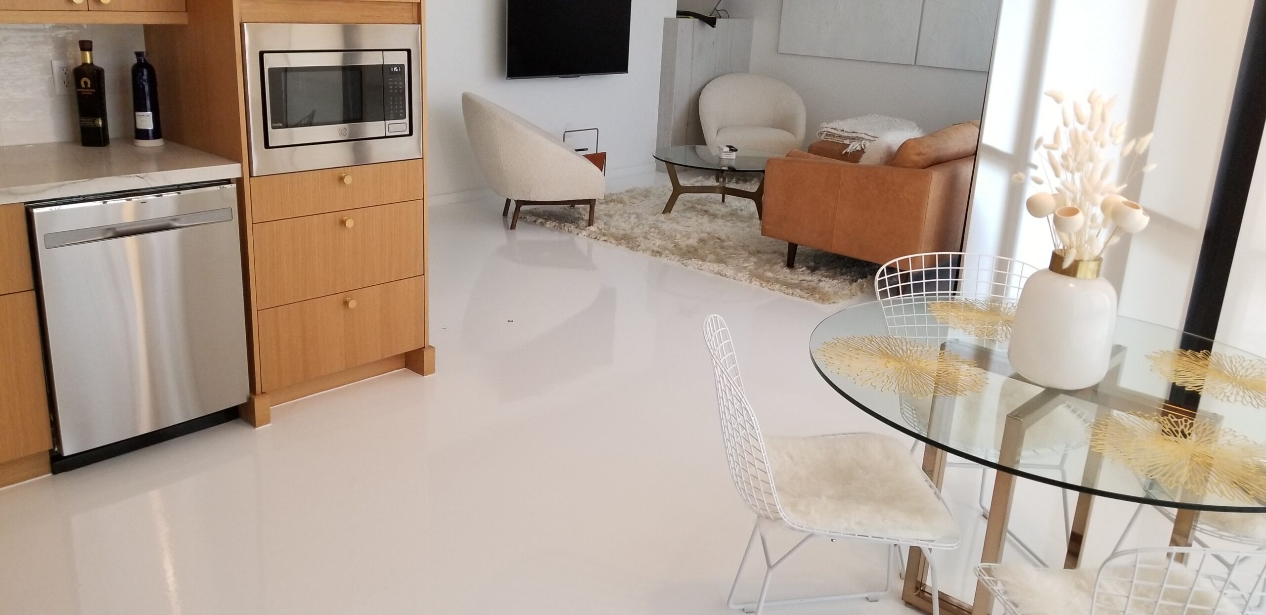 1. modern living room design with metallic epoxy flooring