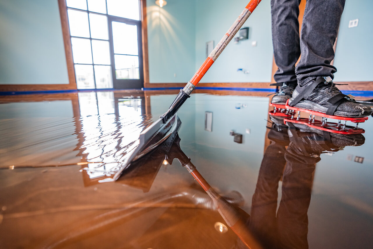 6. preparation and installation This image shows a driveway that was painted with epoxy