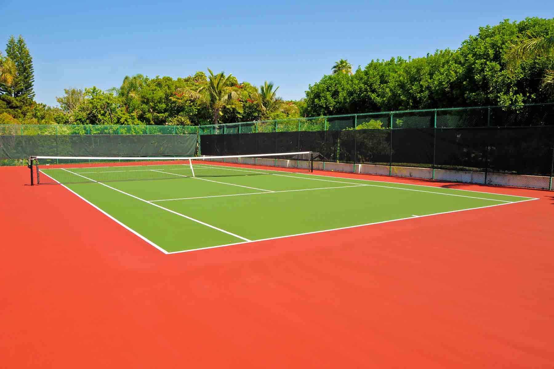 6. tennis court resurfacing cost This image shows a driveway that was painted with epoxy