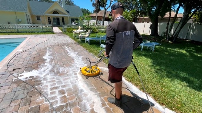 7. textured concrete pool deck maintenance This image shows a driveway that was painted with epoxy