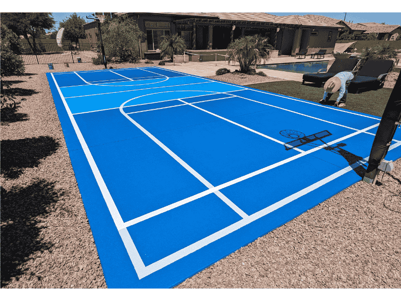 Basketball Court Resurfacing This image shows a pool deck made up of pavers