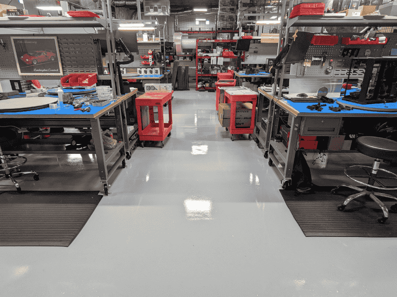 Industrial epoxy flooring This image shows a pool deck made up of pavers
