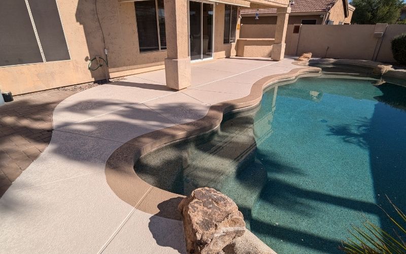 10. concrete overlay on pool deck This image shows a driveway that was painted with epoxy