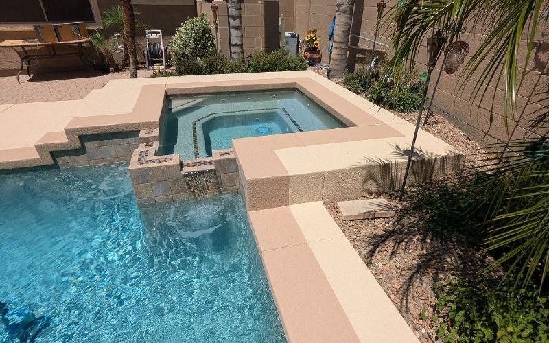 11. pool deck pverlays This image shows a driveway that was painted with epoxy