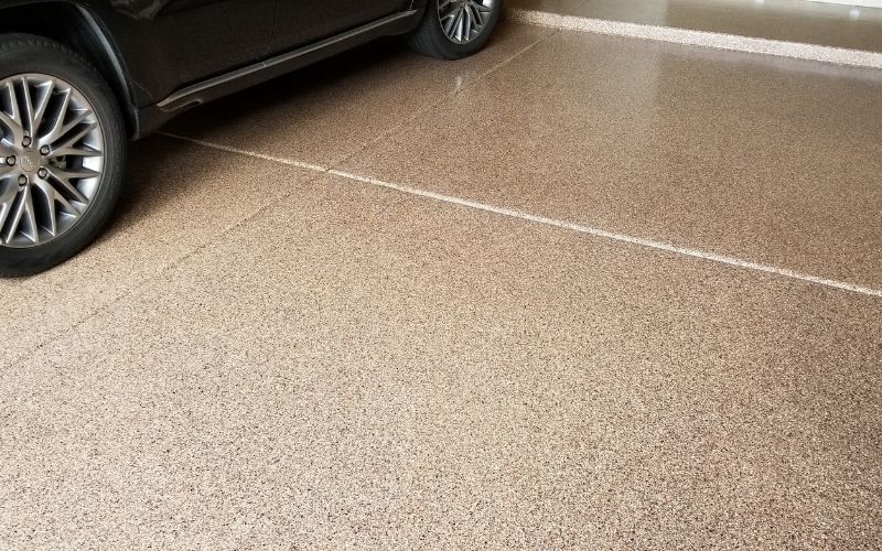 This image shows a driveway that was painted with epoxy