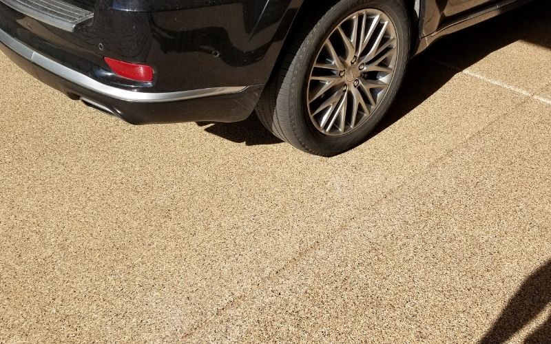 This image shows a driveway that was painted with epoxy